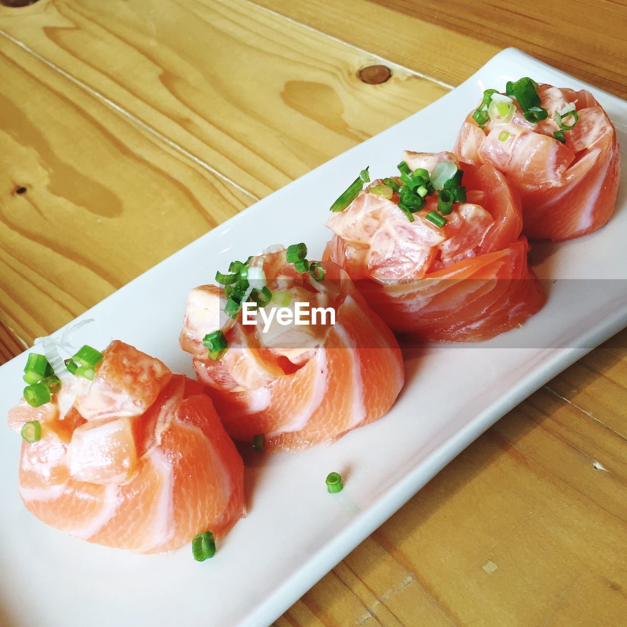 CLOSE-UP OF SERVED FOOD ON TABLE