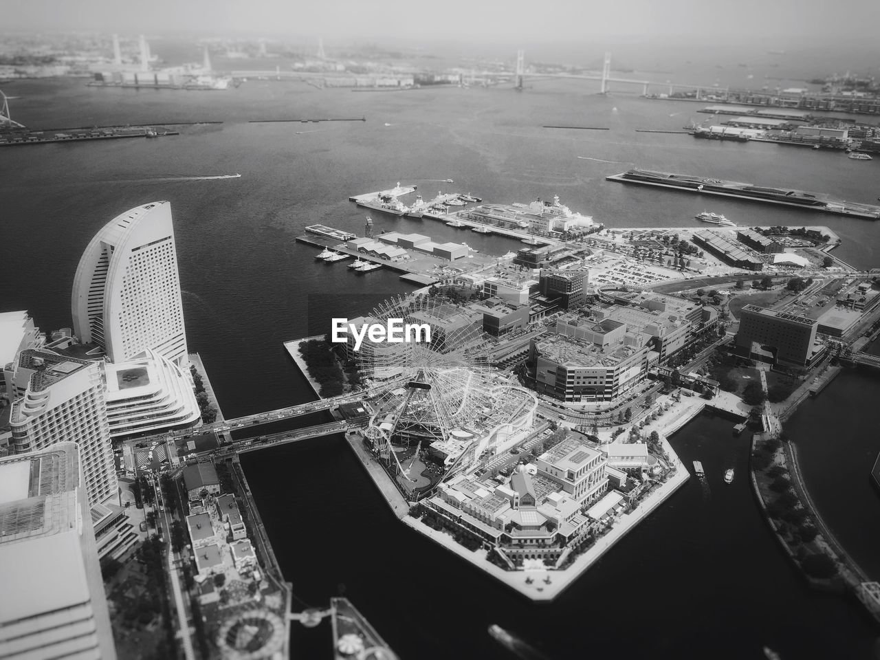 Aerial view of buildings and sea in city