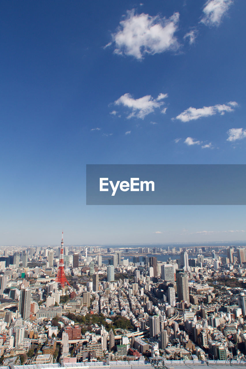 Cityscape against blue sky