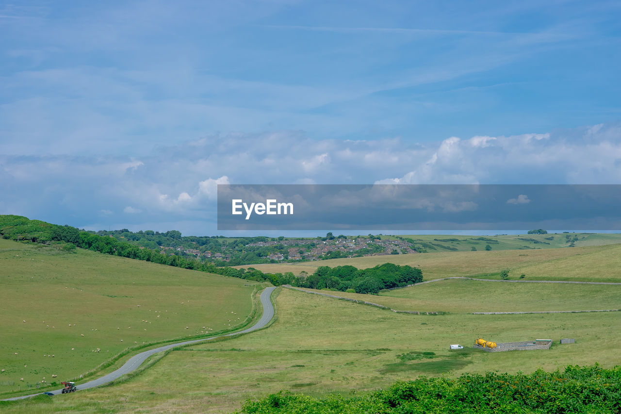 Scenic view of land against sky