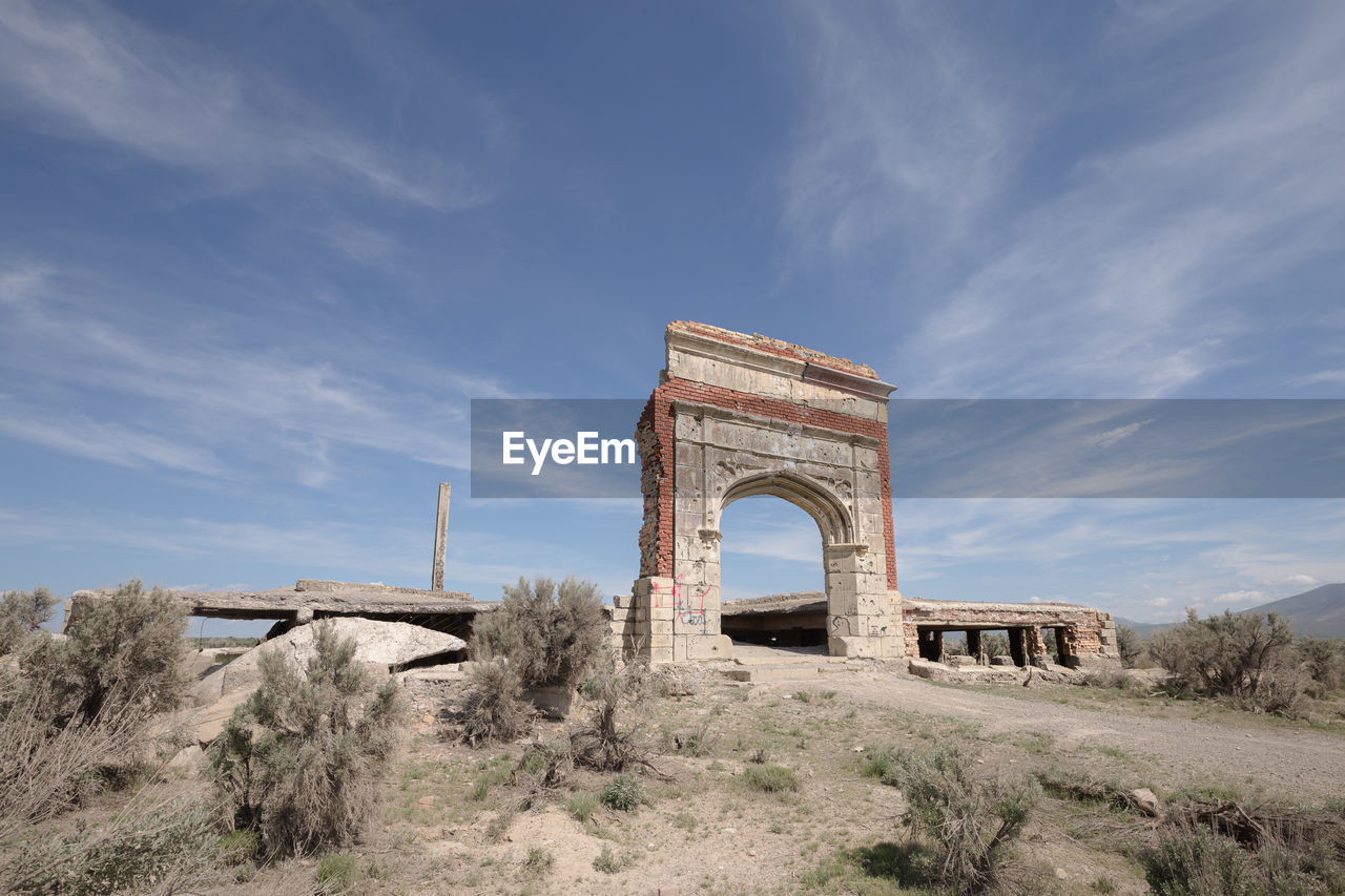 low angle view of old ruins against sky