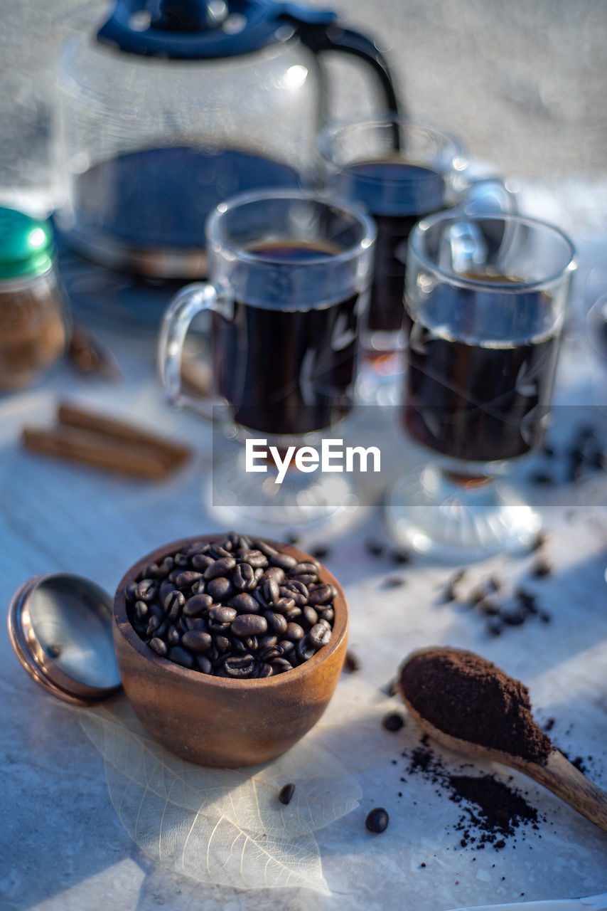 HIGH ANGLE VIEW OF COFFEE BEANS ON TABLE