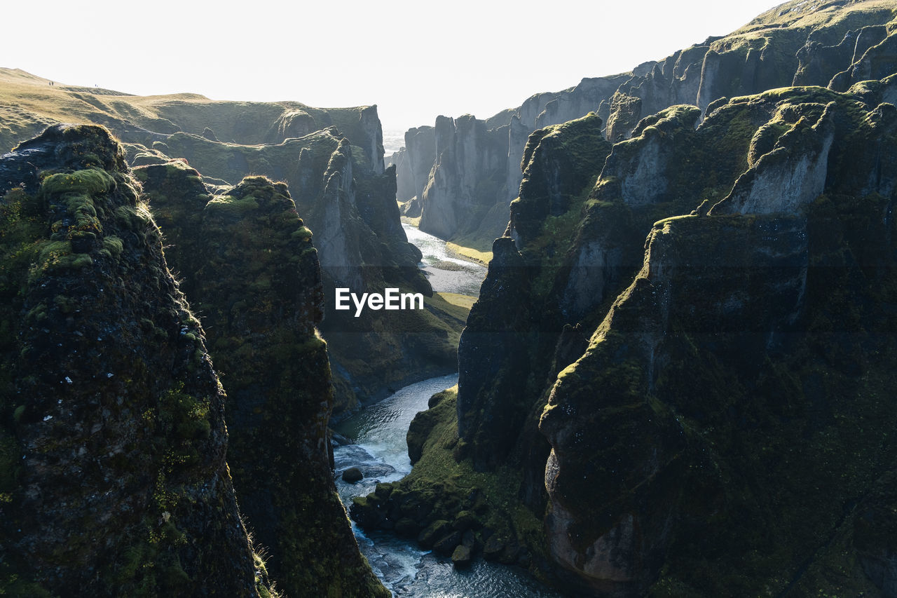 Scenic view of mountains, in the icelandic southern coast, with river passing by the canyon