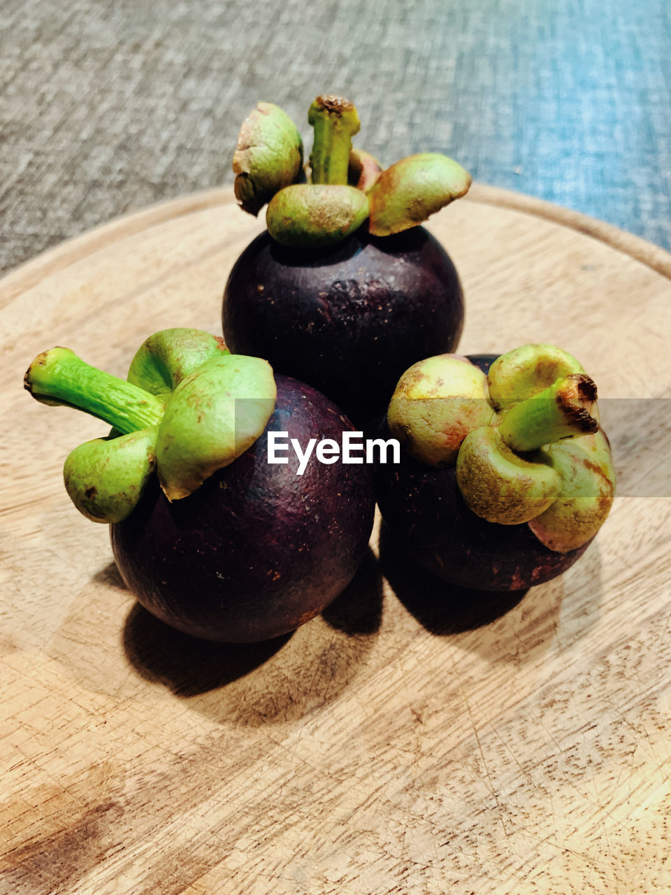 food and drink, food, healthy eating, freshness, wellbeing, fruit, plant, produce, wood, table, green, no people, still life, high angle view, indoors, close-up, common fig, fig