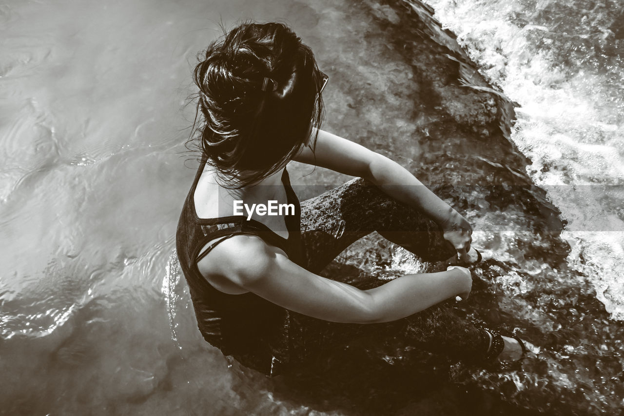 High angle view of woman in sea