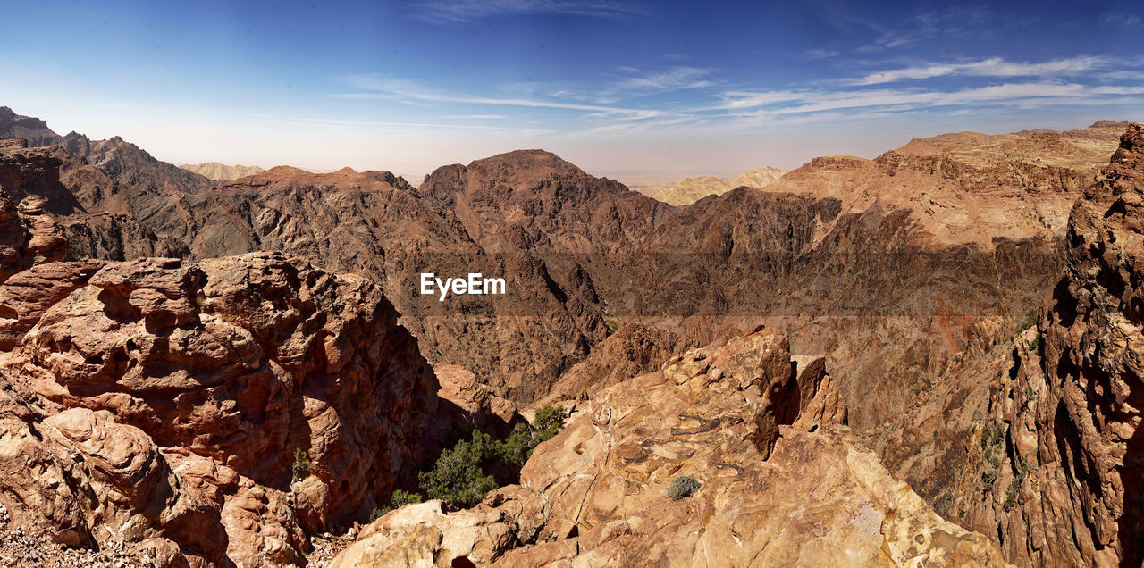 Scenic view of rocky mountains against sky