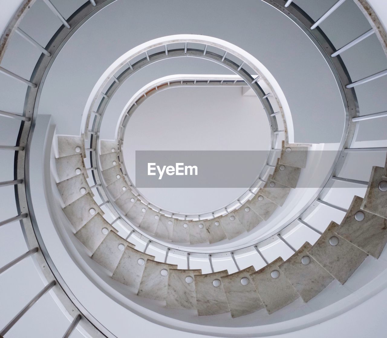 Directly below shot of spiral staircase