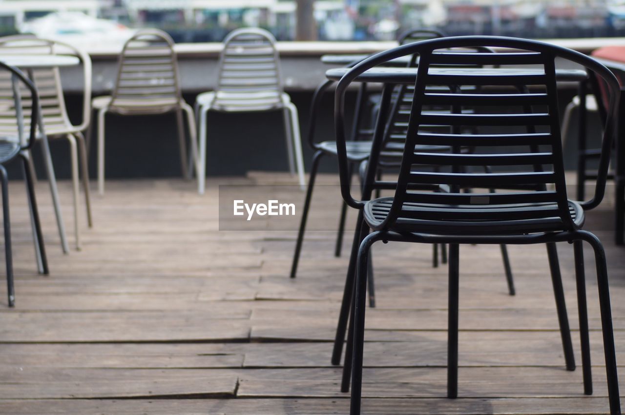 Empty chairs and table in cafe