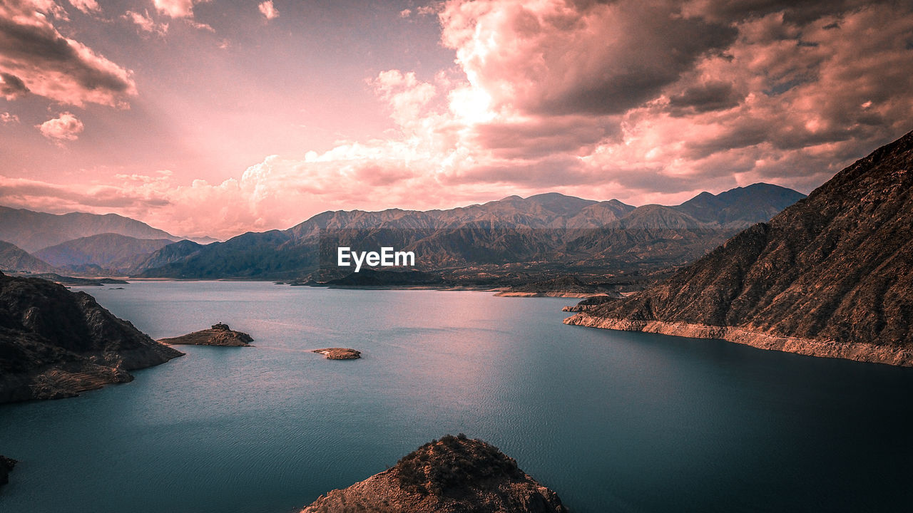 Panoramic view of lake against sky during sunset