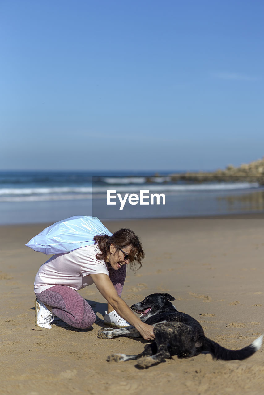 VIEW OF HORSE ON BEACH