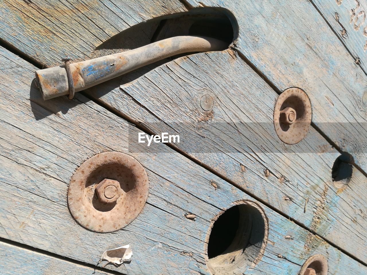 HIGH ANGLE VIEW OF OLD MACHINE PART
