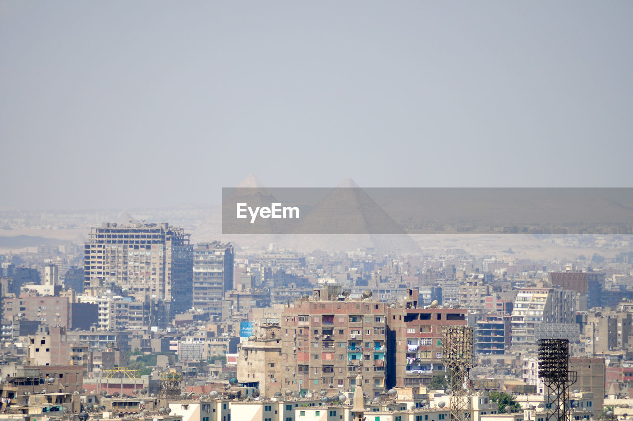 Cityscape against clear sky