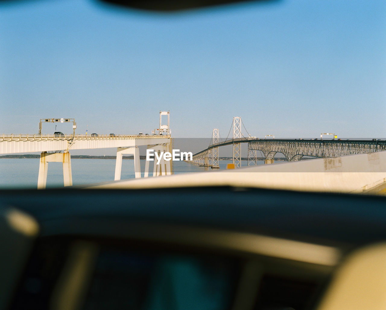 VIEW OF BRIDGE OVER RIVER AGAINST SKY