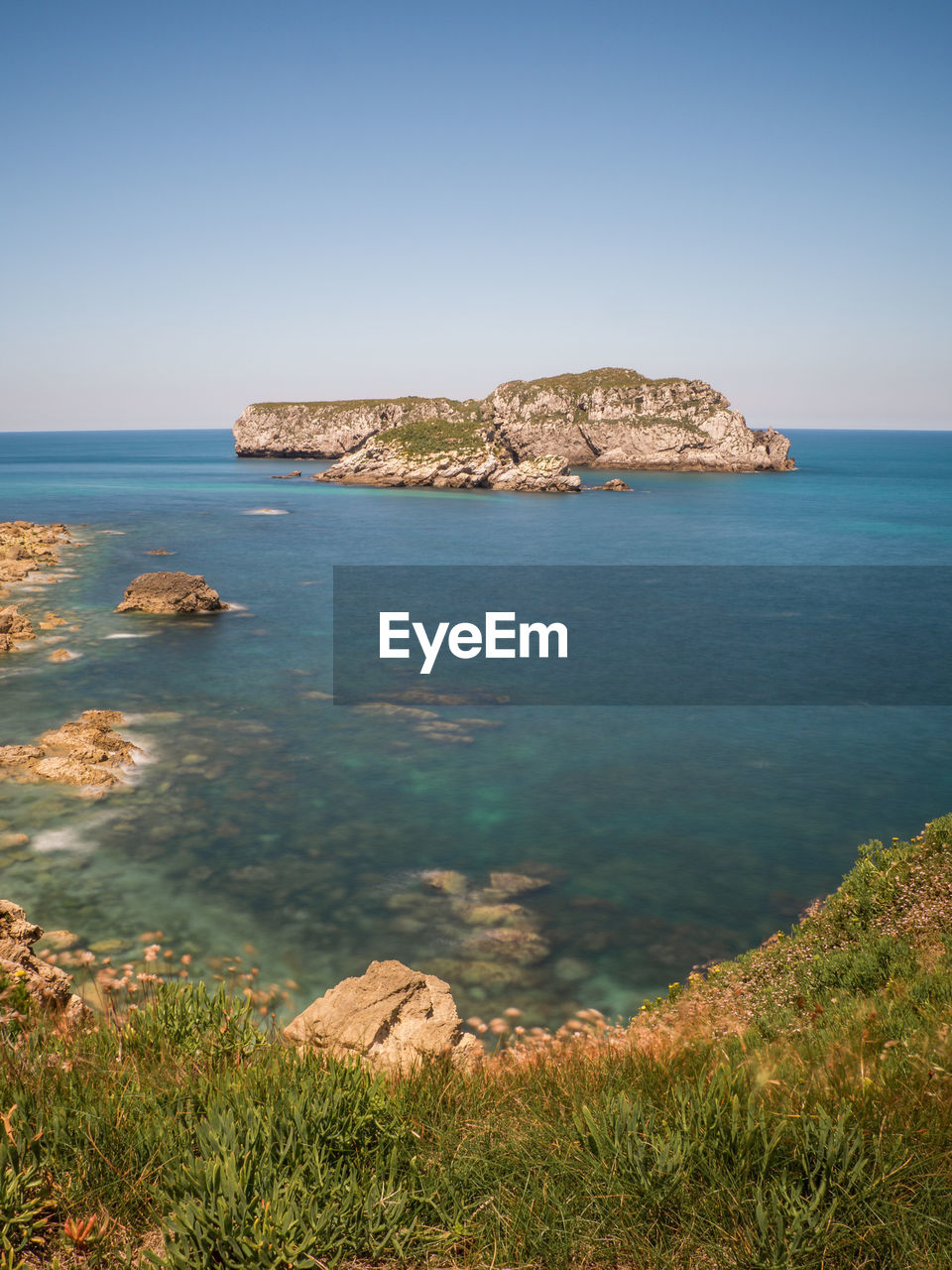 Scenic view of sea against clear sky