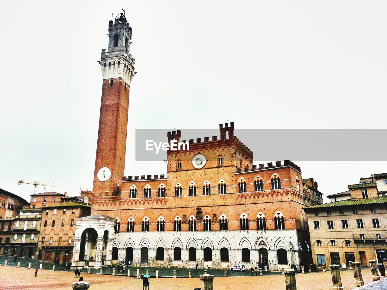 Low angle view of palazzo pubblico against clear sky