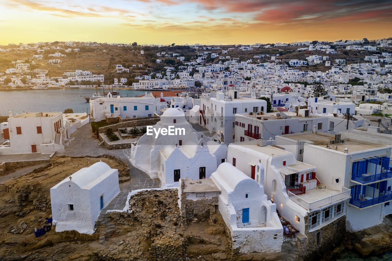 Aerial view of city during sunset