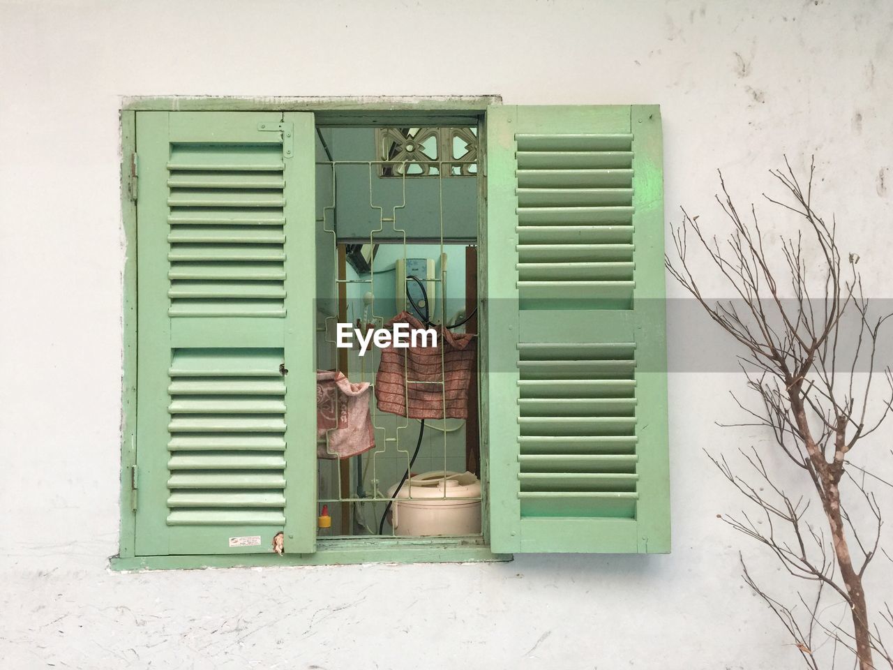 Open window on wall of old building