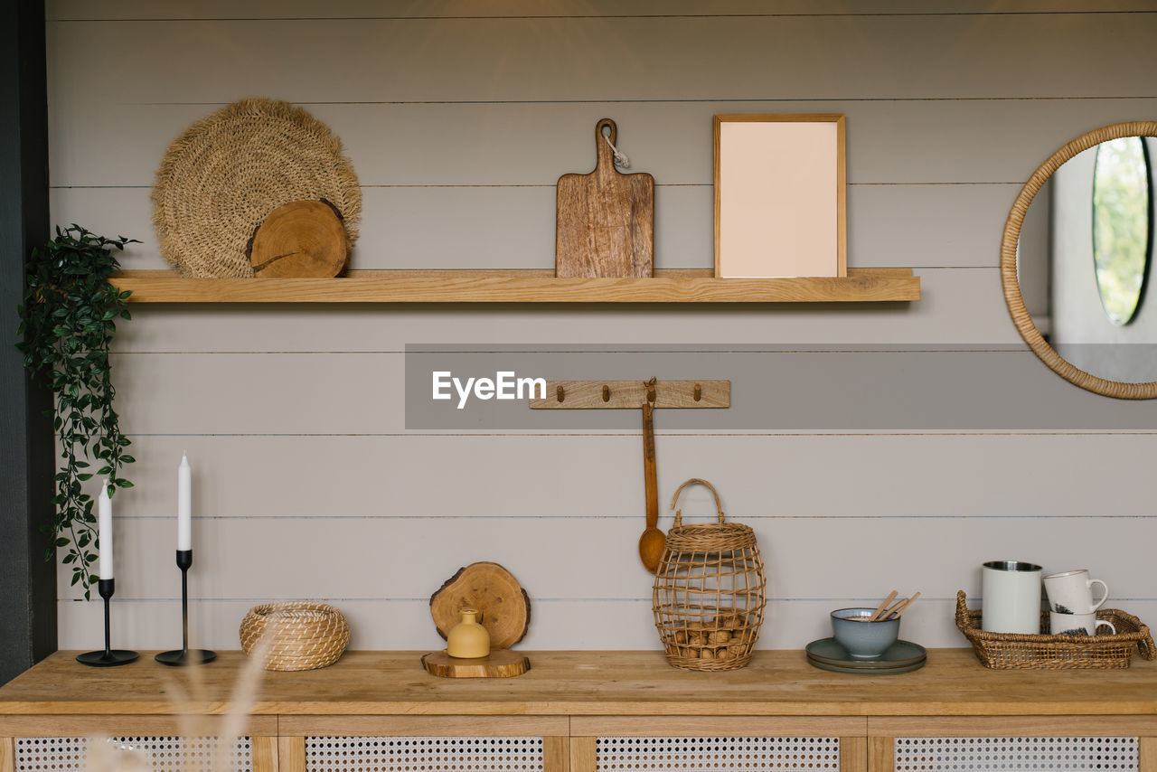 Kitchen accessories and decor in a scandinavian-style wooden kitchen