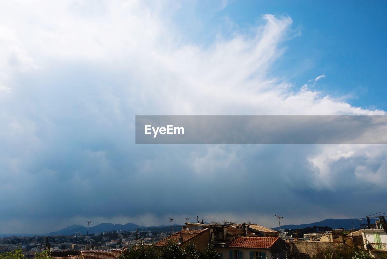 TOWNSCAPE AGAINST SKY