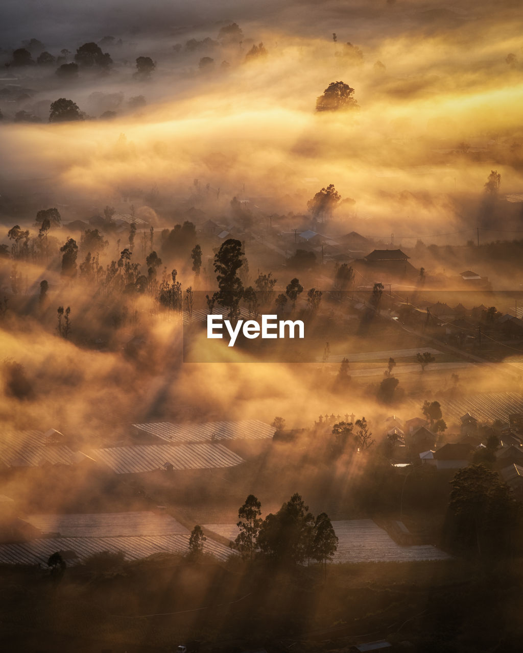 Aerial view of landscape during sunset