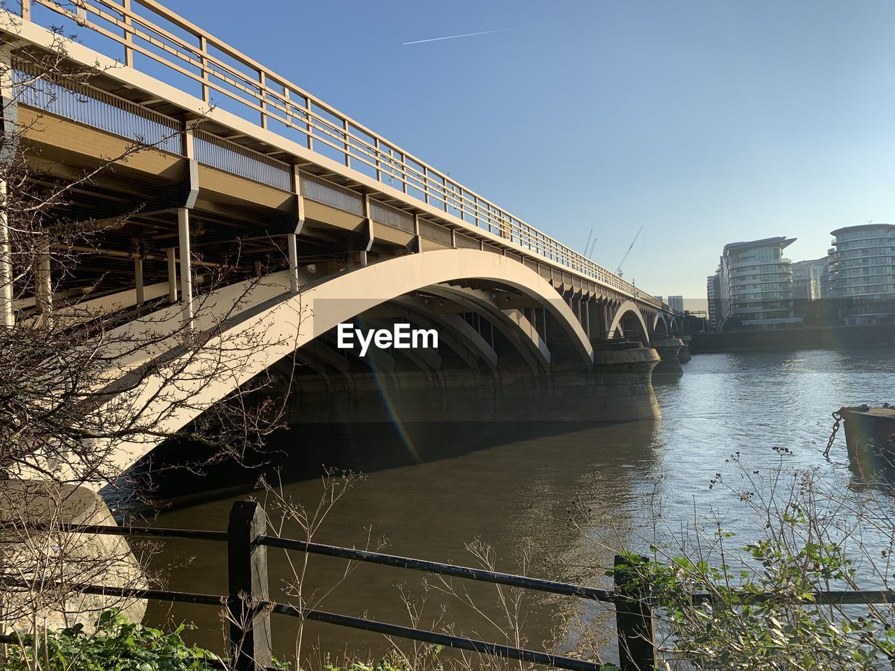 Bridge over river against sky