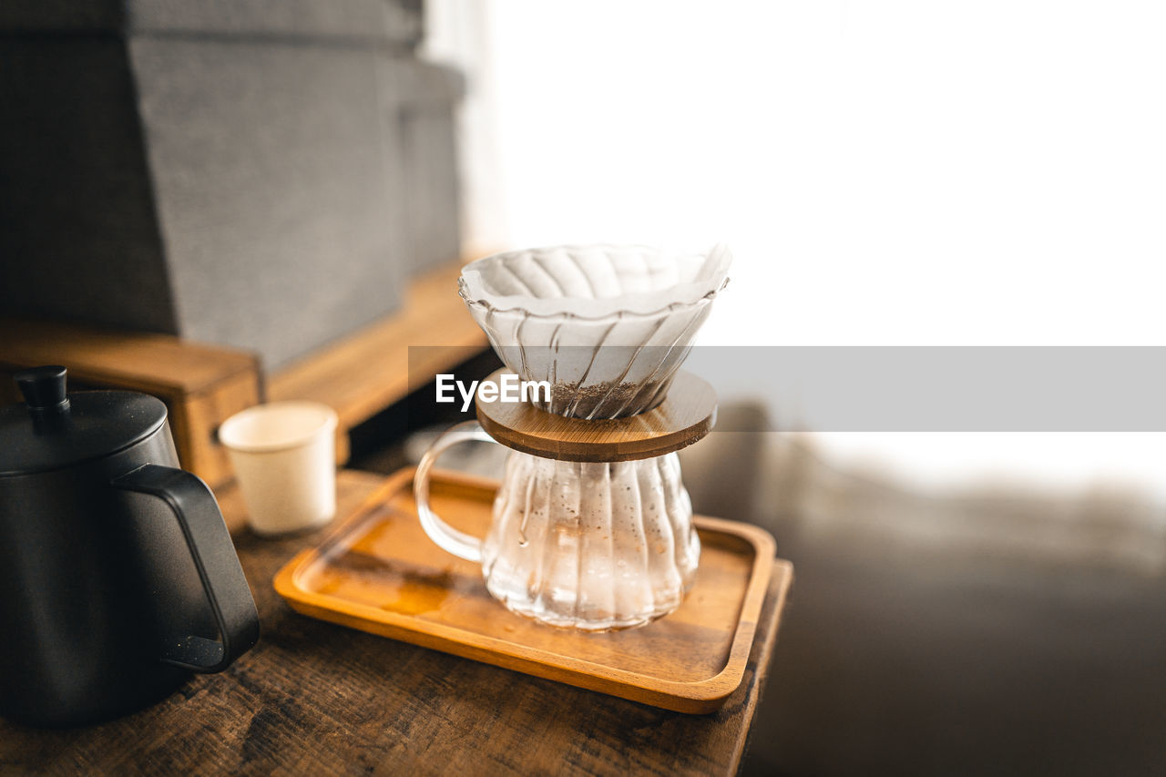 Close-up of coffee cup on table