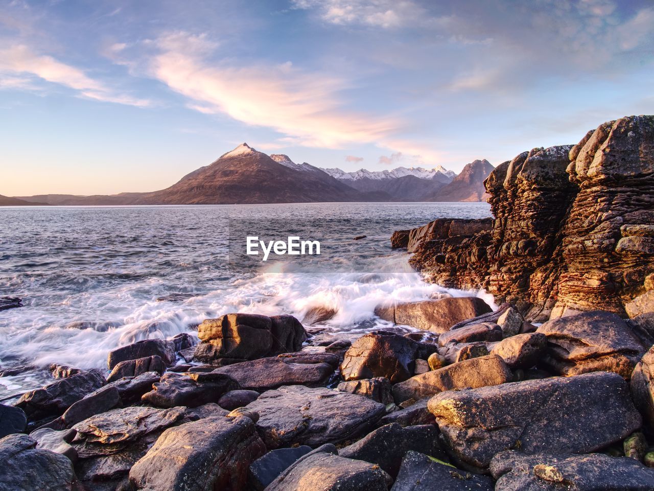 The famous rocky bay of elgol on the isle of skye, scotland. the cuillins mountain in the background