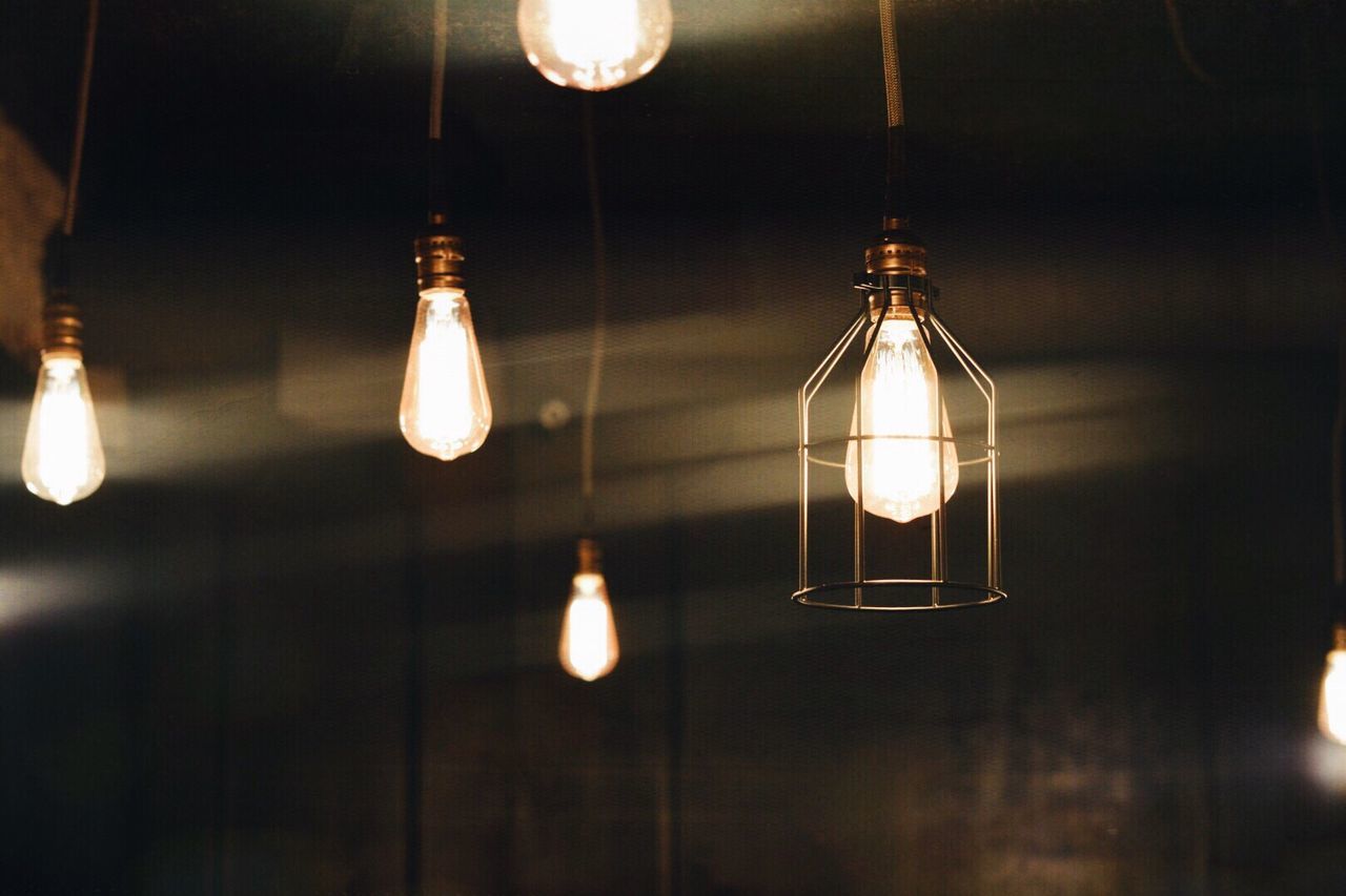 Illuminated light bulbs hanging