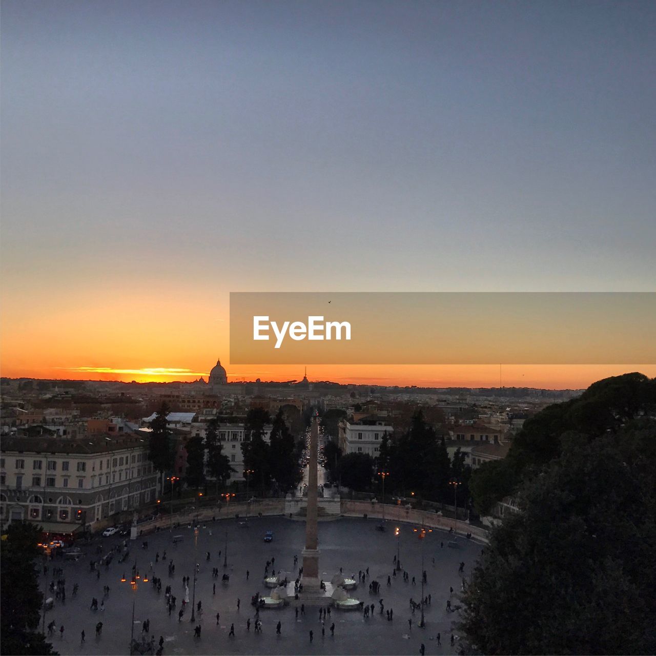 Cityscape against sky during sunset