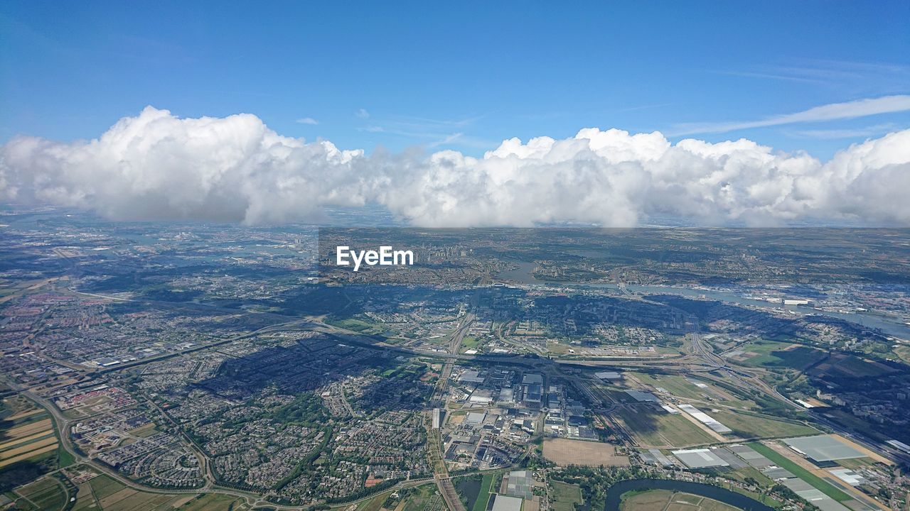 Aerial view of cityscape against sky