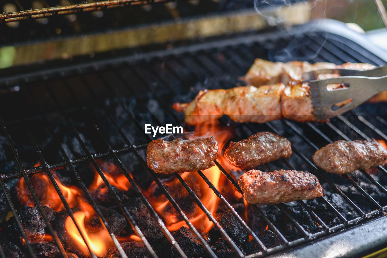 Close-up of meat on barbecue grill