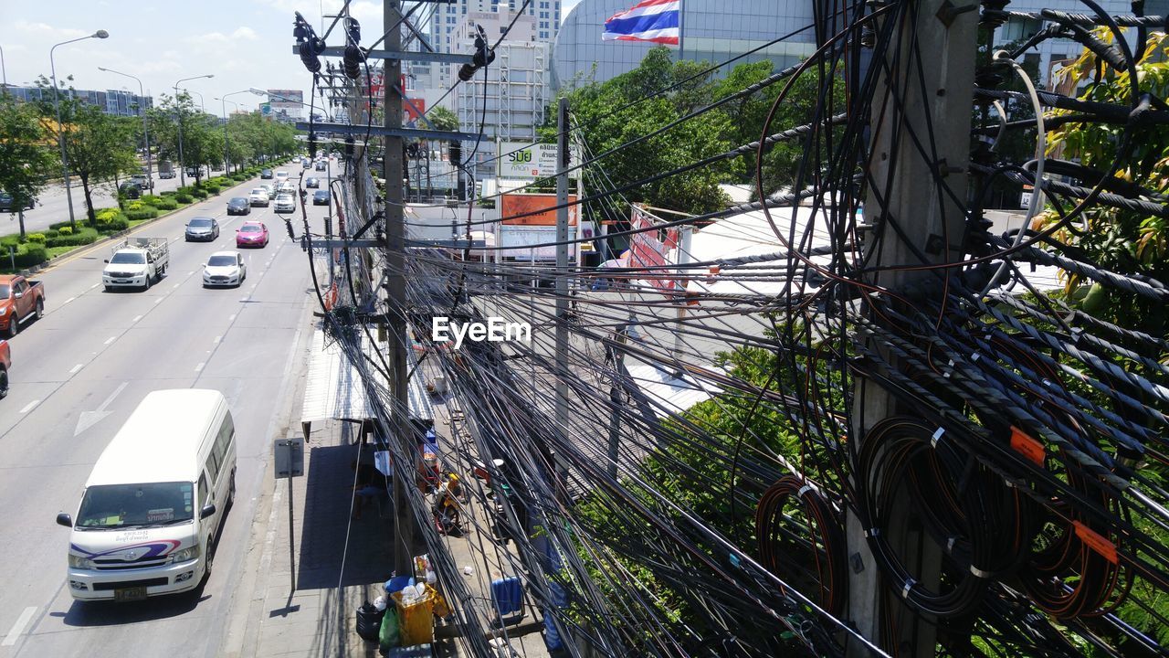 PANORAMIC VIEW OF CARS ON CITY STREET