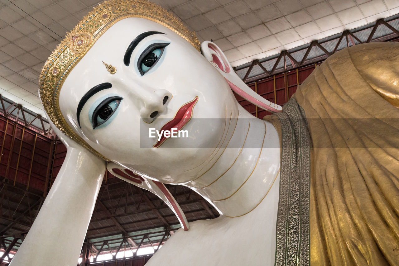 CLOSE-UP LOW ANGLE VIEW OF STATUE