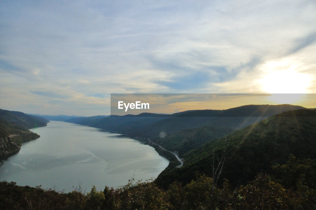 SCENIC VIEW OF MOUNTAIN AGAINST CLOUDY SKY