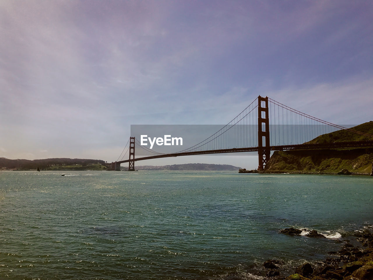 View of suspension bridge over sea