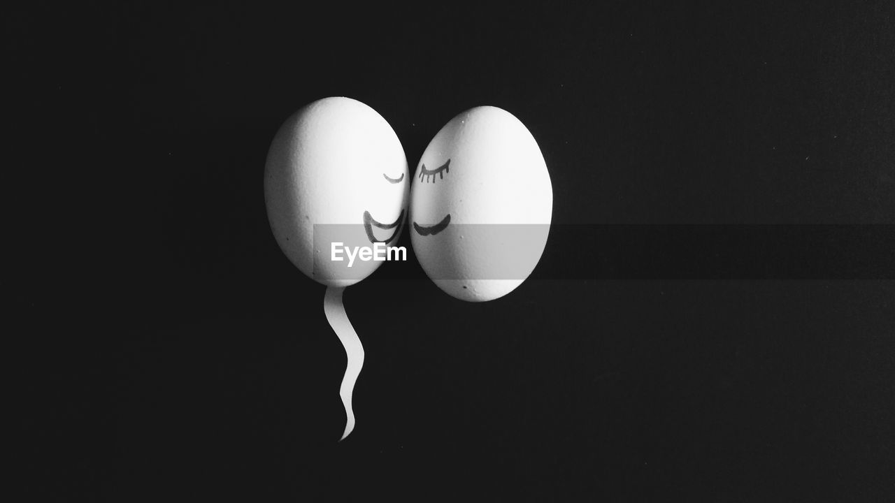 Close-up of easter eggs against black background