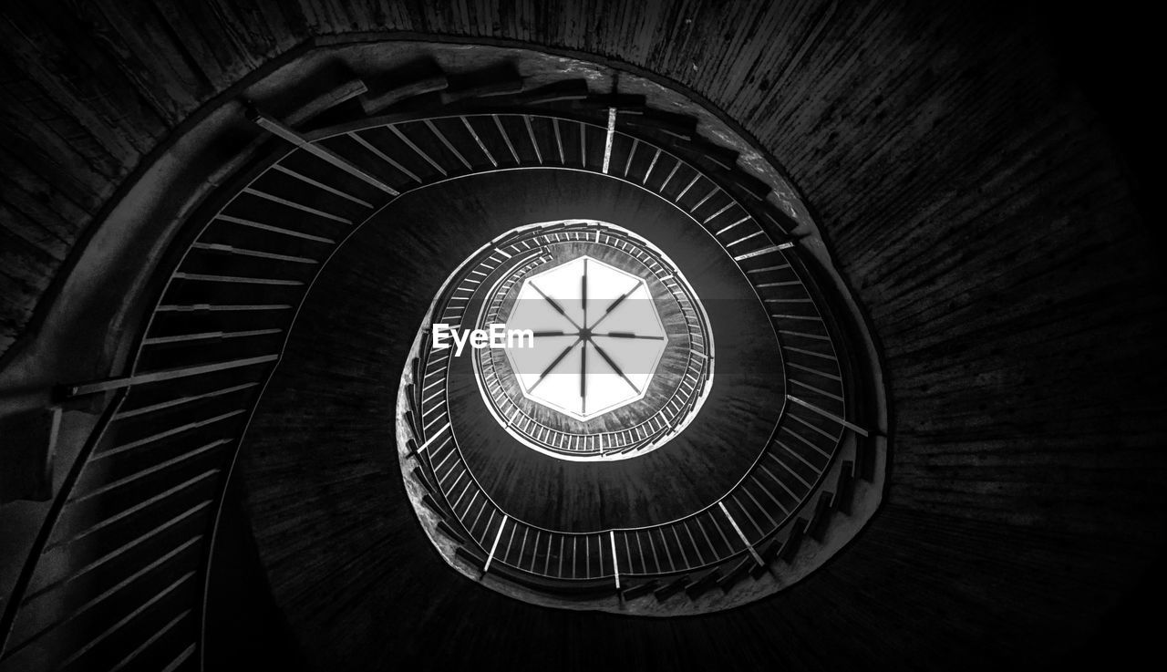 Low angle view of spiral staircase in building