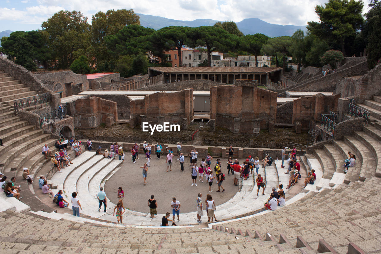 HIGH ANGLE VIEW OF TOURISTS AT BUILDING