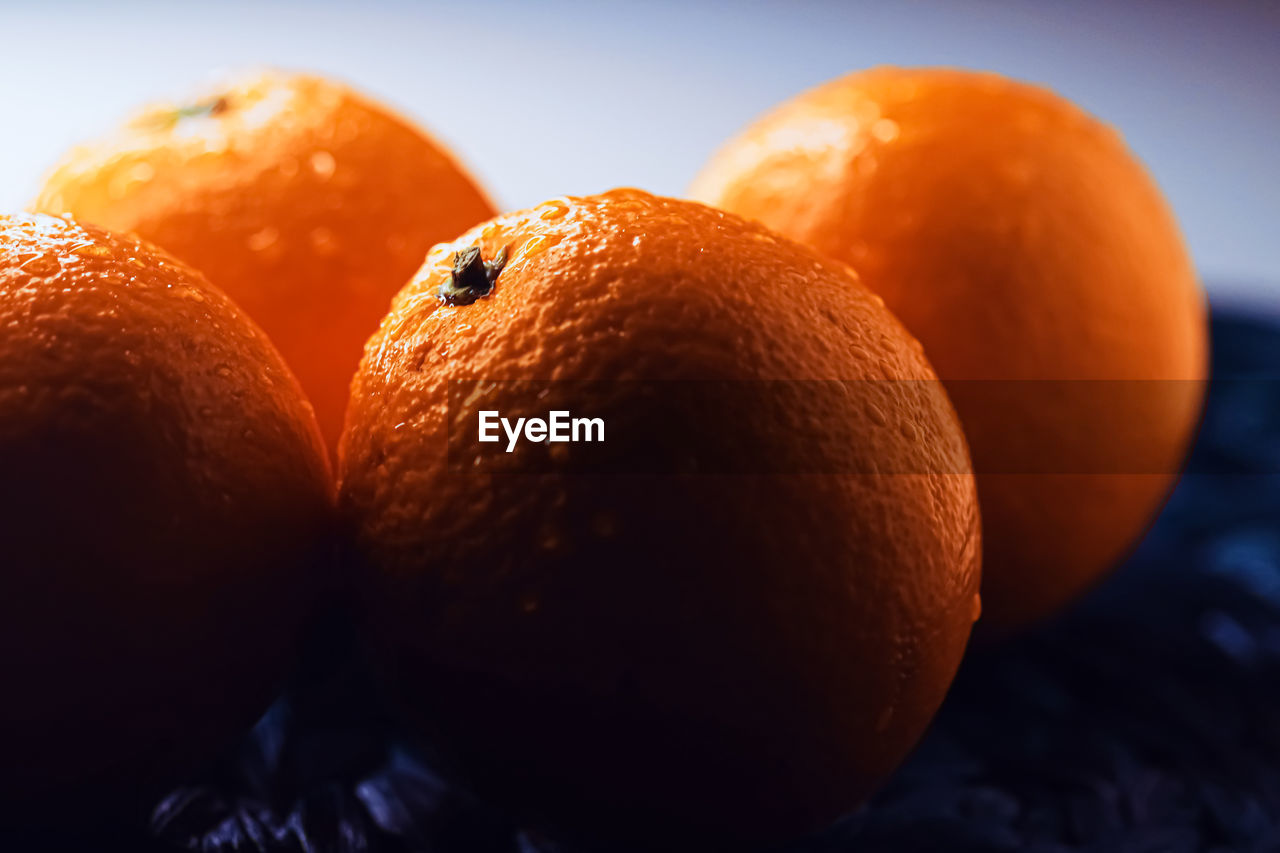 Close-up of oranges on table