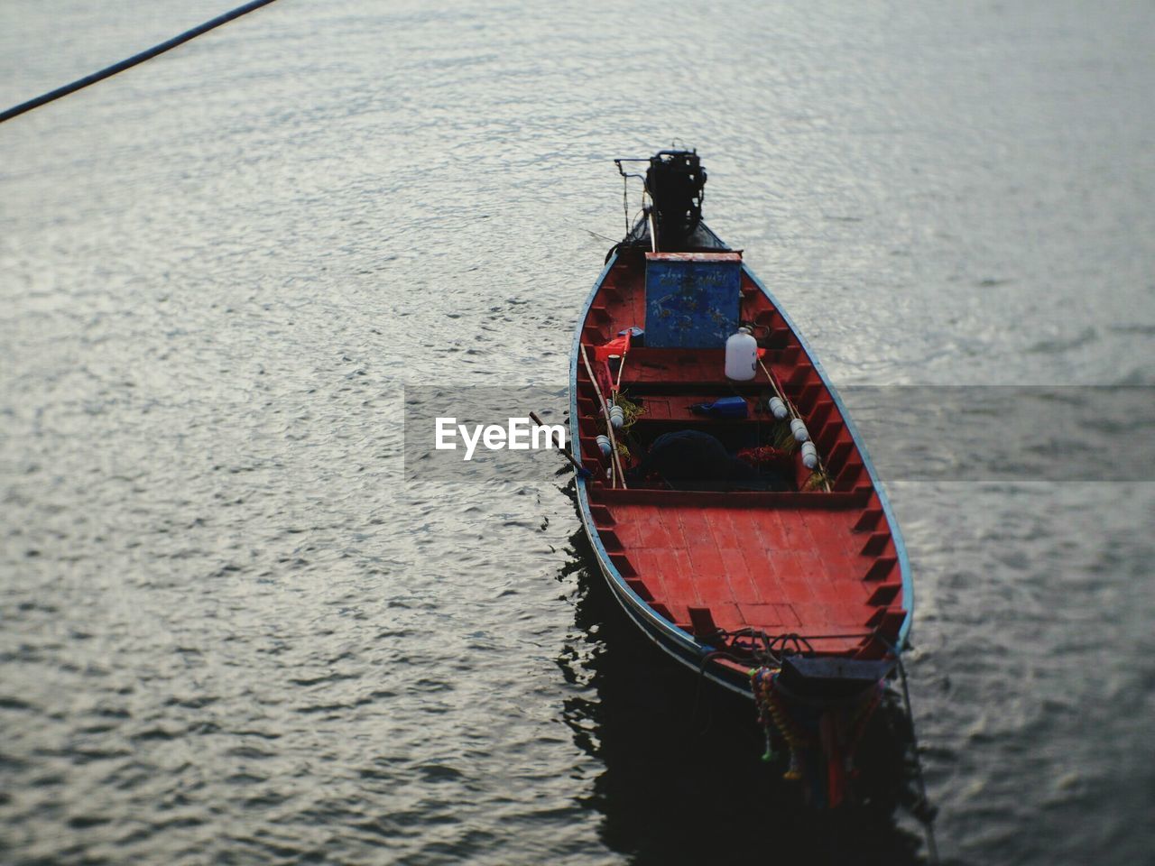 High angle view of rowboat sailing in sea