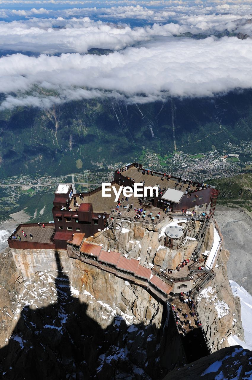 High angle view of buildings by sea