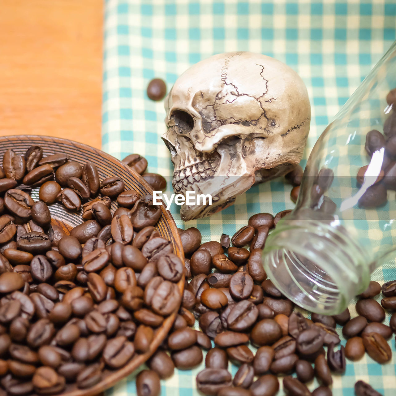 Close-up of coffee beans on table