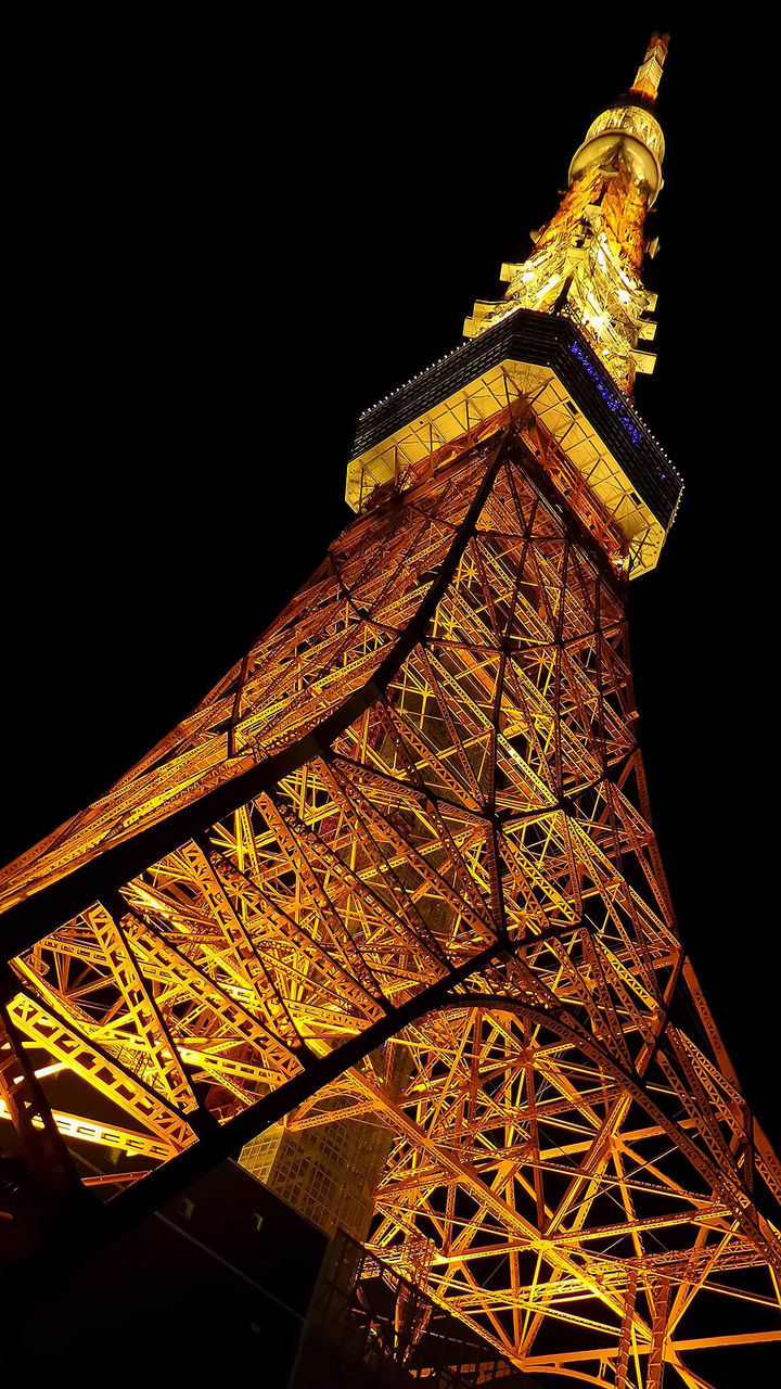 Tokyo tower shining on rainy night