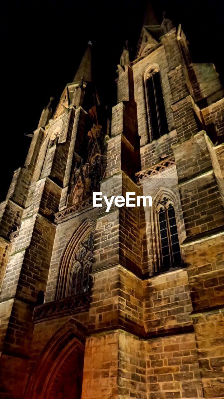 Low angle view of st elizabeth church at night