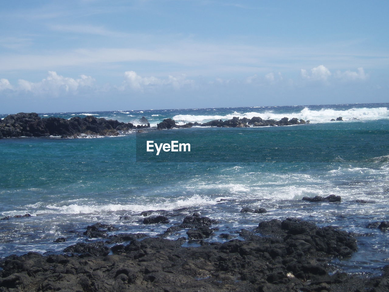 SCENIC VIEW OF SEA AGAINST BLUE SKY