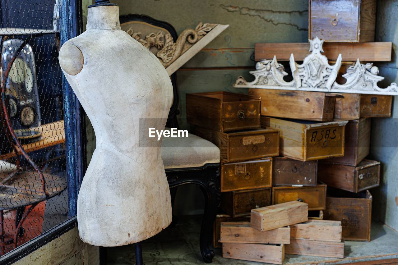 wood, art, no people, ancient history, workshop, indoors, craft, furniture, store, container, retail