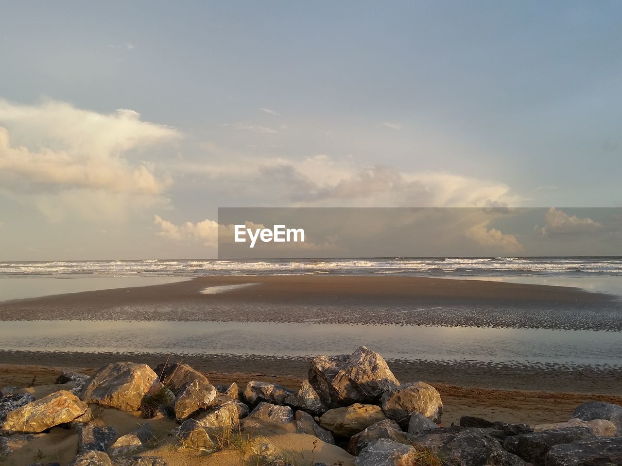 BEACH AGAINST SKY