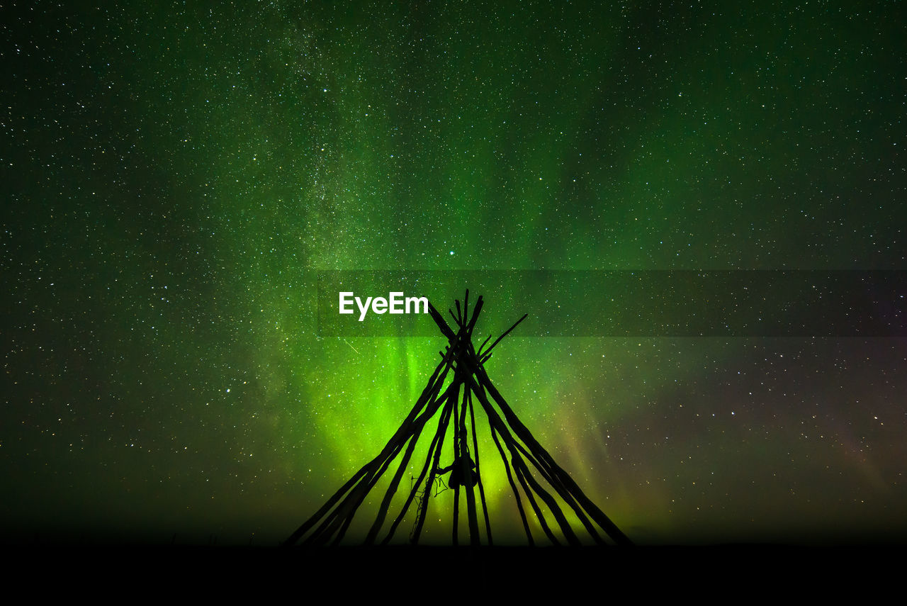 Low angle view of bonfire against sky at night