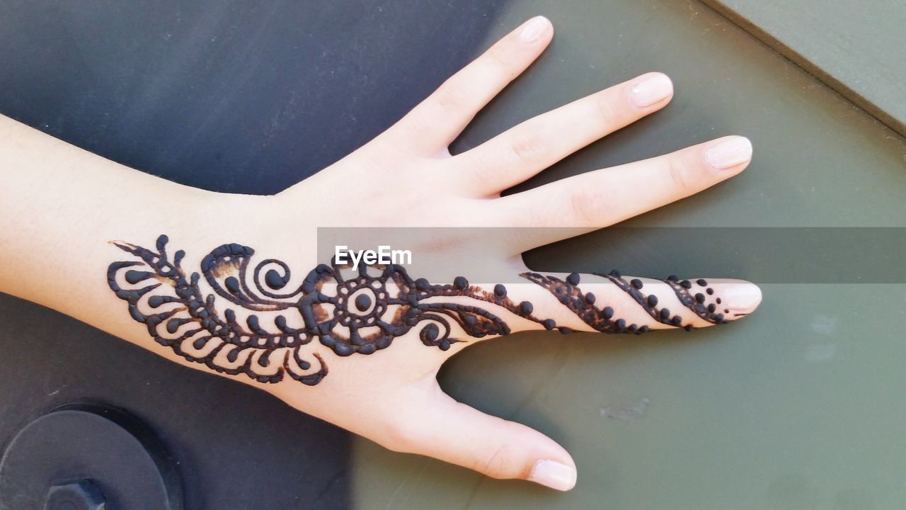 Henna design on hand