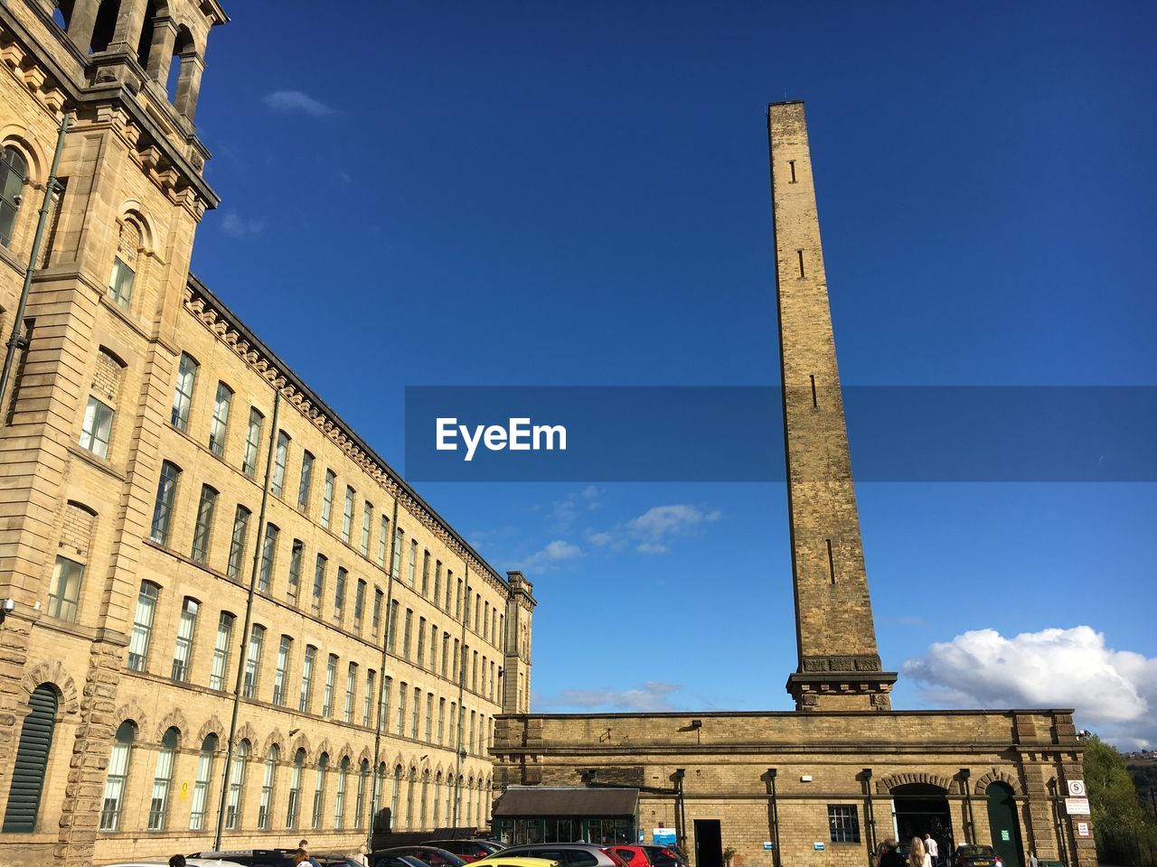 LOW ANGLE VIEW OF TOWER AGAINST BLUE SKY